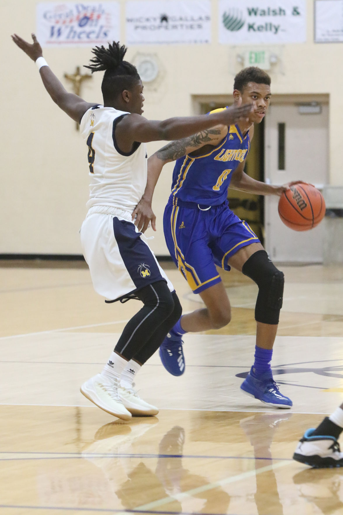 Gallery: Lighthouse at Marquette Catholic boys basketball